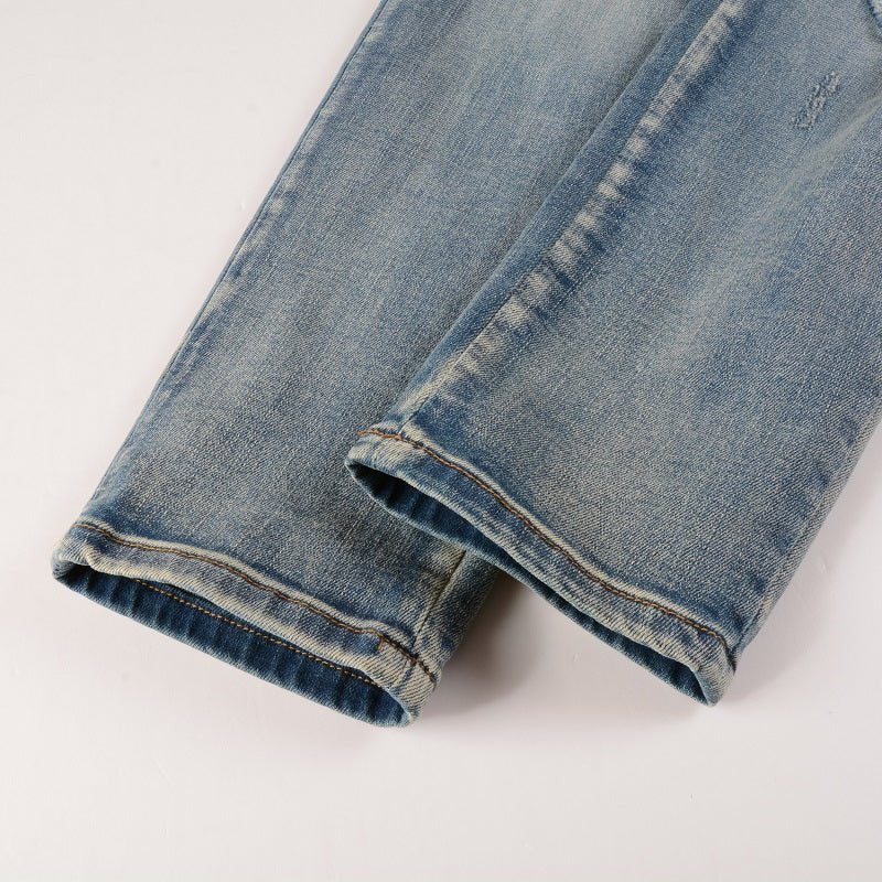 Amiri Luxus Slim Fit Snake Applikations Blue Jeans für Herren – Stylischer Denim