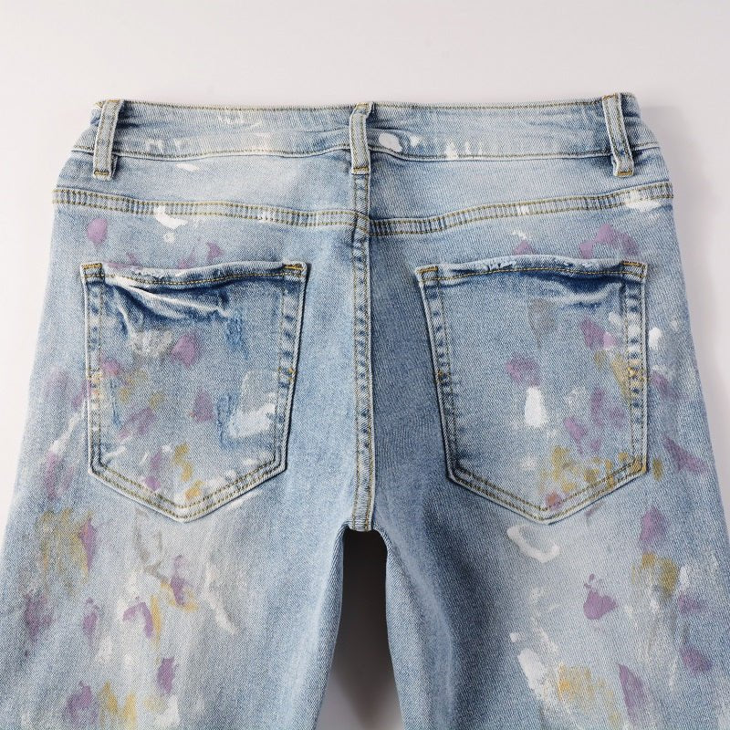 Amiri Herren Designer Jeans mit Farbspritzern – Stylische Blaue Denim Hose