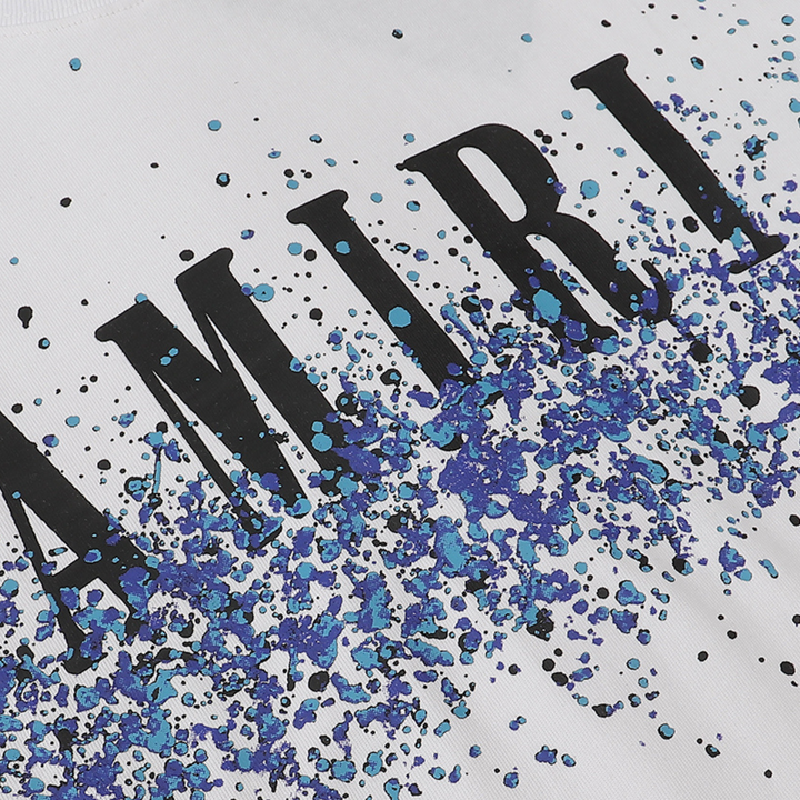 Amiri Paint Splatter T-Shirt: Luxuriöses Designer Streetwear Oberteil mit Kunstvollem Farbspritzer-Muster