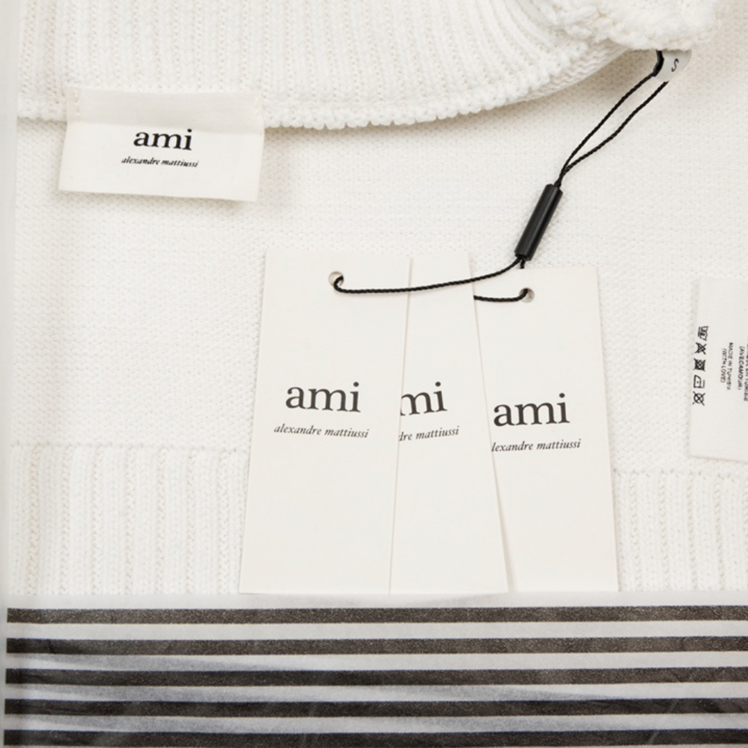 Eleganter AMI Paris Pullover: Zeitloses Design, Hohe Qualität, Vielseitiger Parisianer Stil