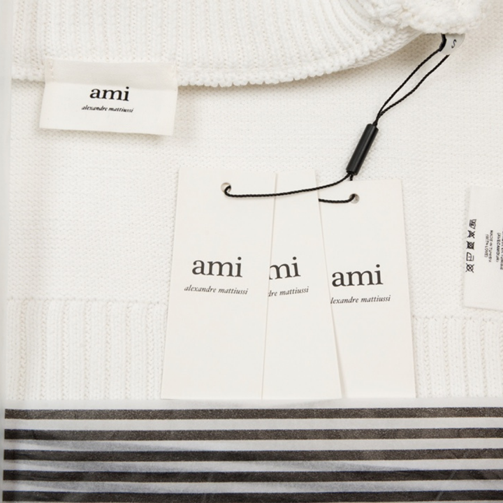 Eleganter AMI Paris Pullover: Zeitloses Design, Hohe Qualität, Vielseitiger Parisianer Stil