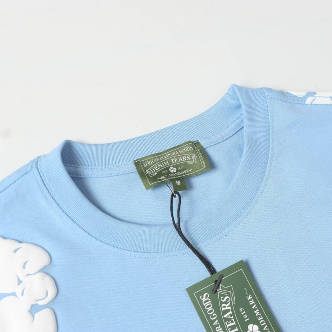 Denim Tears Himmelblaues Kurzarm-Set: Exklusiver Sommer-Style mit Komfort und Design