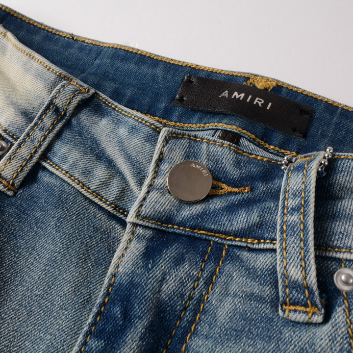 Amiri Camo Logo Jeans: Stylische Designer Stretch Denim Hose mit Tarnmuster