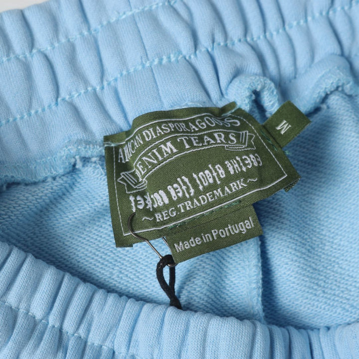Denim Tears Himmelblaues Kurzarm-Set: Exklusiver Sommer-Style mit Komfort und Design