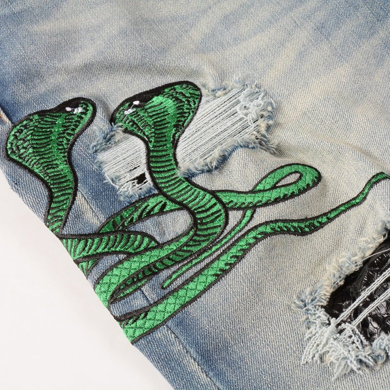 Amiri Luxus Slim Fit Snake Applikations Blue Jeans für Herren – Stylischer Denim