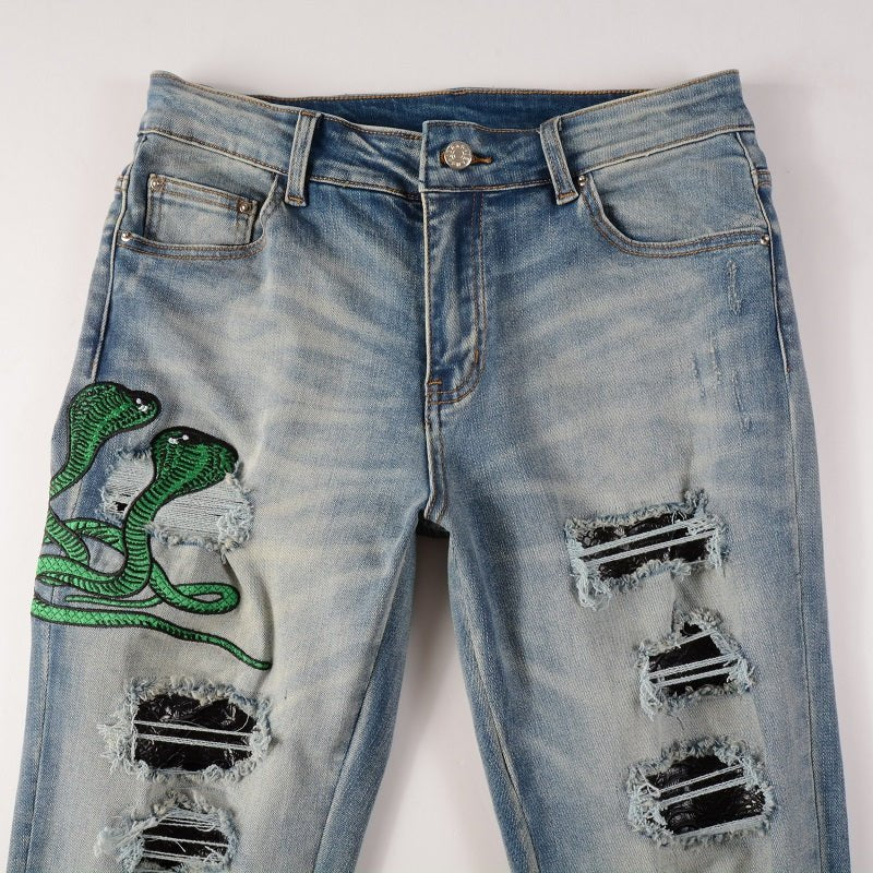 Amiri Luxus Slim Fit Snake Applikations Blue Jeans für Herren – Stylischer Denim