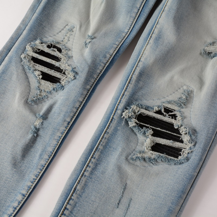 Amiri Herren Luxus Schwarze Patch Jeans – Designer Denim mit Destroyed Look