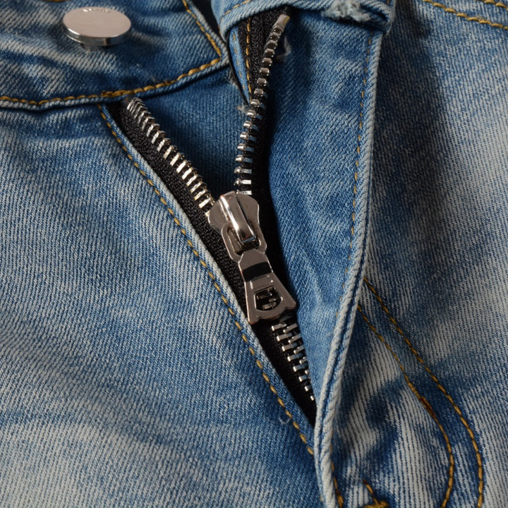 Amiri Herren Luxus Schwarze Patch Jeans – Designer Denim mit Destroyed Look