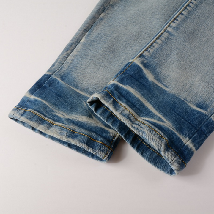 Amiri Herren Luxus Schwarze Patch Jeans – Designer Denim mit Destroyed Look