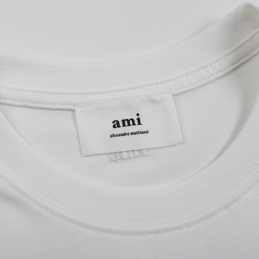 AMI Paris Unisex Baumwoll-T-Shirt mit gesticktem Herz-Logo – Stilvoller Pariser Chic
