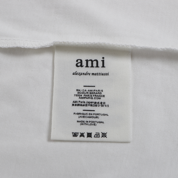 AMI Paris Unisex Baumwoll-T-Shirt mit gesticktem Herz-Logo – Stilvoller Pariser Chic