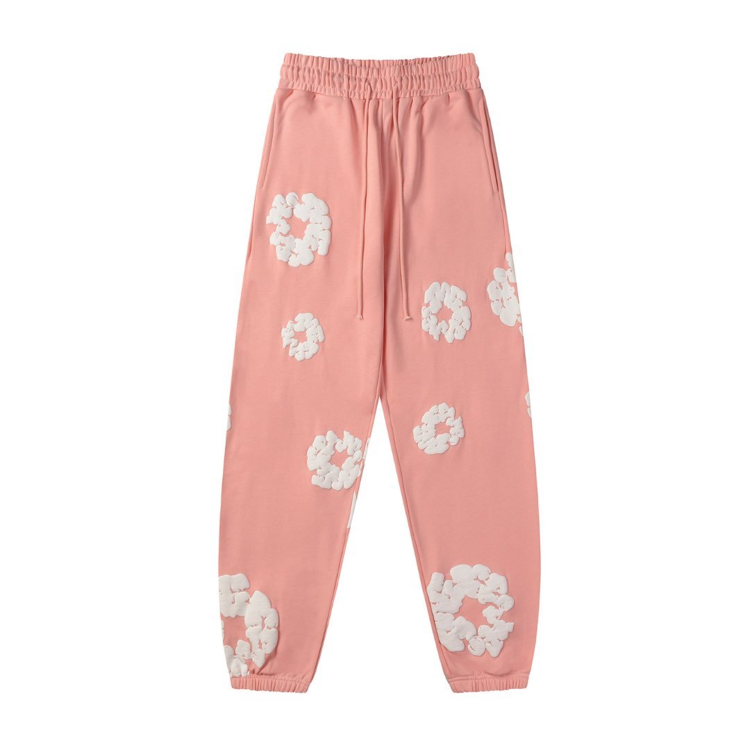 Denim Tears Rosa Baumwoll-Trainingsanzug: Stilvoller Freizeit-Look für Damen und Herren