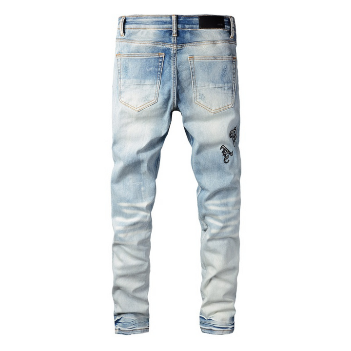 Amiri Blaue Distressed Designer Jeans für Herren – Stylisch, Hochwertig, Modern