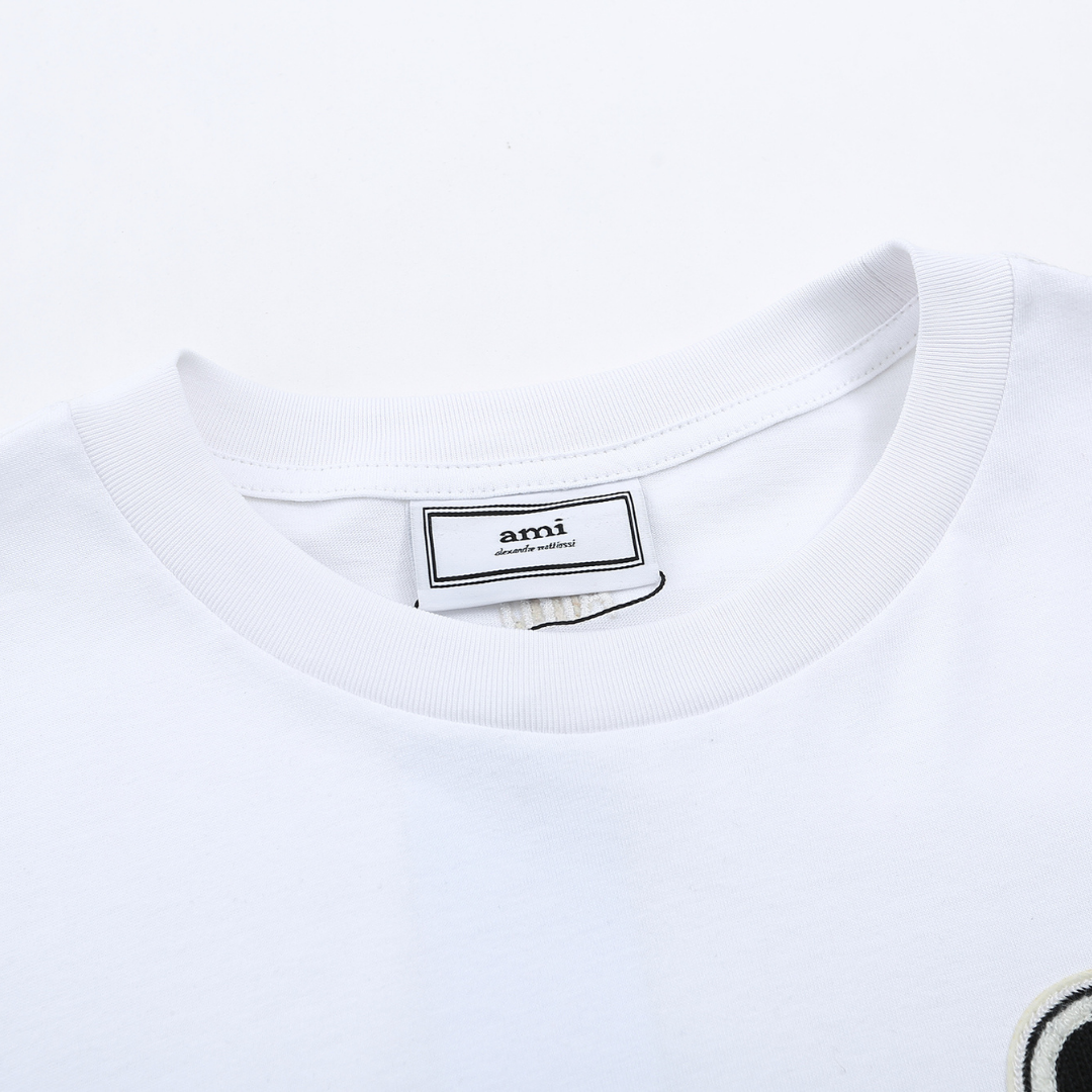 Stylisches AMI Paris Baumwoll-T-Shirt mit Herz-Logo für Herren