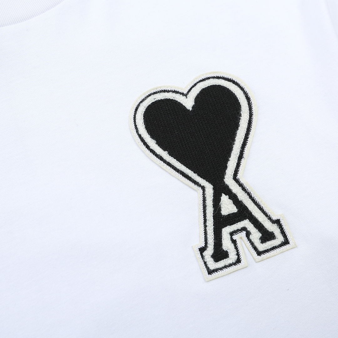 Stylisches AMI Paris Baumwoll-T-Shirt mit Herz-Logo für Herren