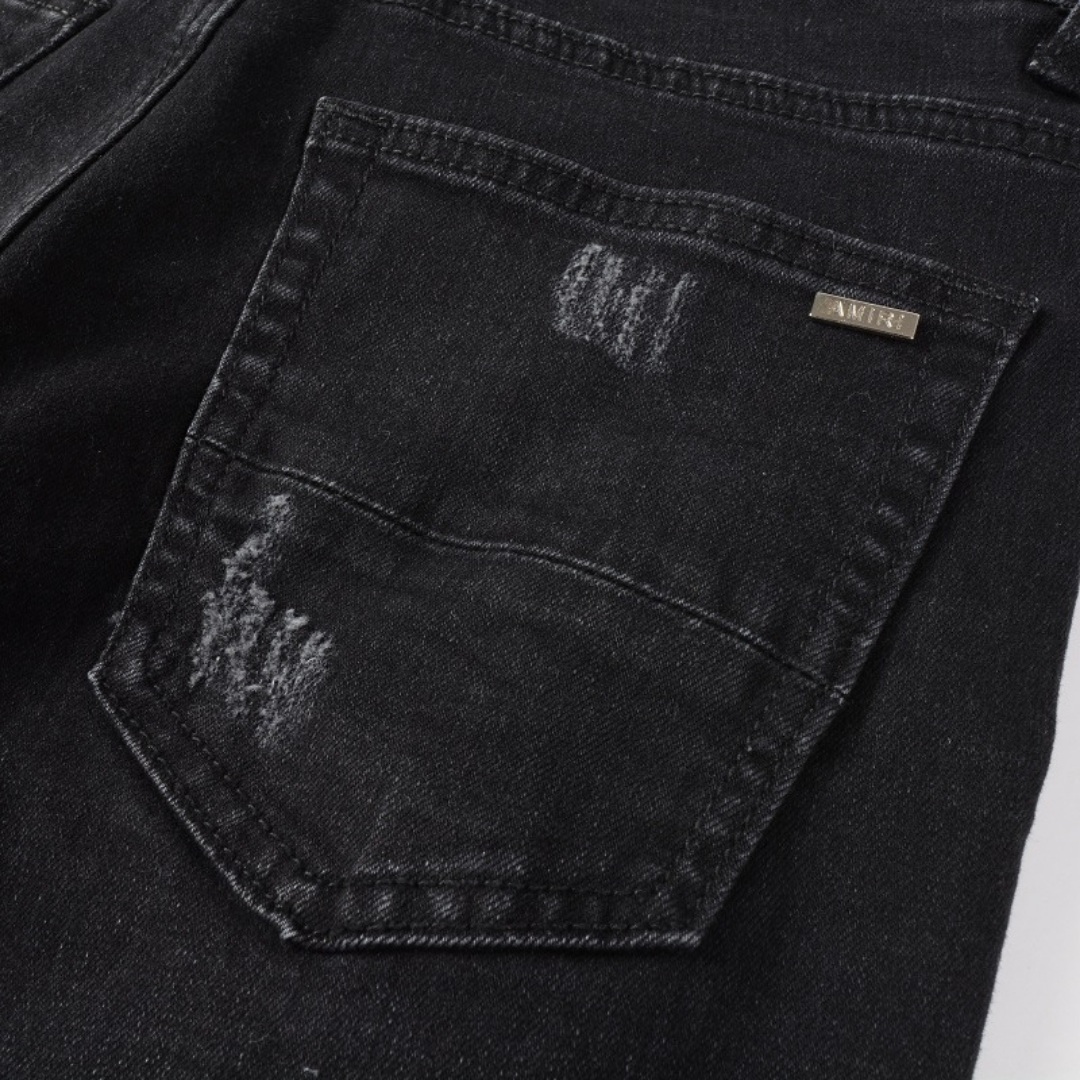 Luxuriöse Amiri Paint Splatter Jeans für Herren – Distressed Streetwear Denim