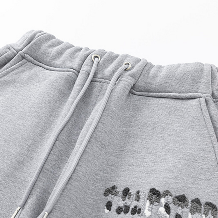 Trapstar Decoded Grauer Trainingsanzug: Luxuriöser Streetwear-Stil für Herren, Bequem & Trendy