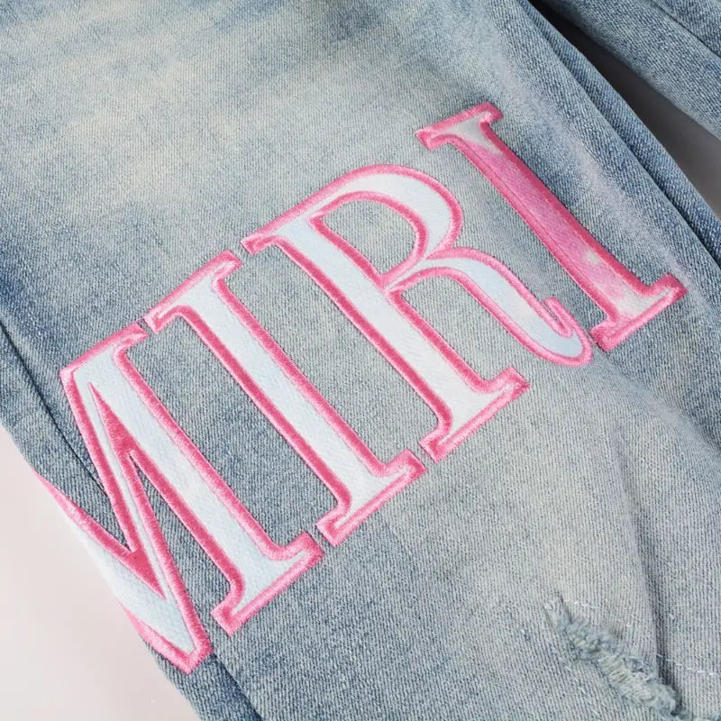Luxuriöse Amiri Herren Designer Used-Look Jeans mit Logo und Destroyed Effekten