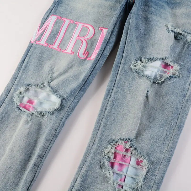 Luxuriöse Amiri Herren Designer Used-Look Jeans mit Logo und Destroyed Effekten