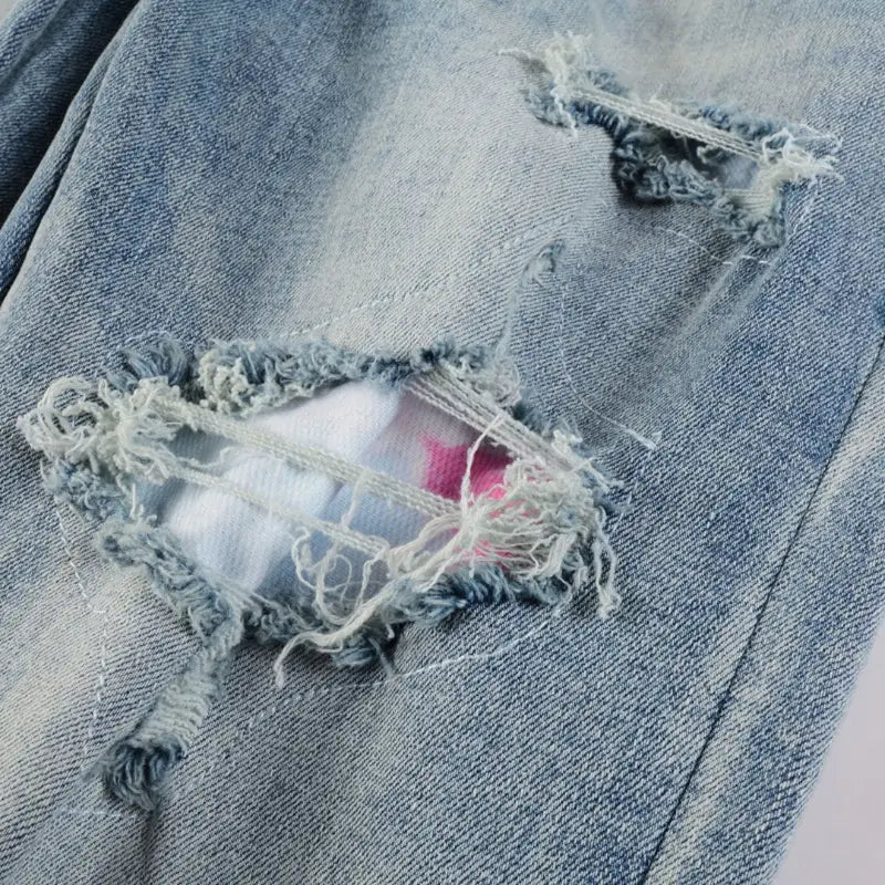 Luxuriöse Amiri Herren Designer Used-Look Jeans mit Logo und Destroyed Effekten