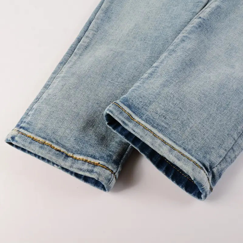 Luxuriöse Amiri Herren Designer Used-Look Jeans mit Logo und Destroyed Effekten