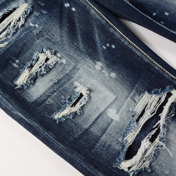 Amiri Paint Drip Blaue Herrenjeans – Luxuriöser Streetwear-Stil mit einzigartigem Design