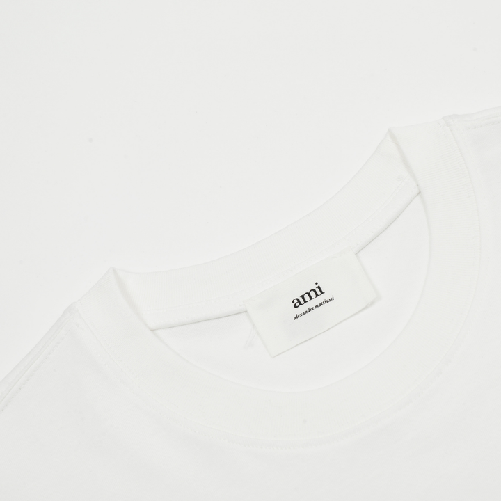 AMI Paris Unisex T-Shirt aus Baumwolle mit Herzlogo – Luxuriöses Designer Basic