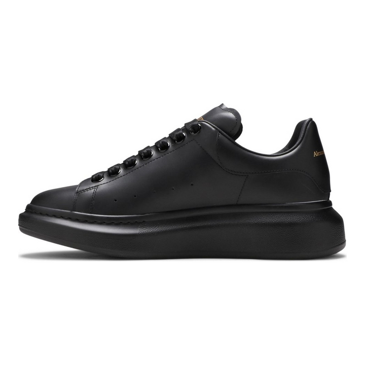 Alexander McQueen Schwarzer Leder Sneaker: Luxus, Komfort & Ikonischer Stil