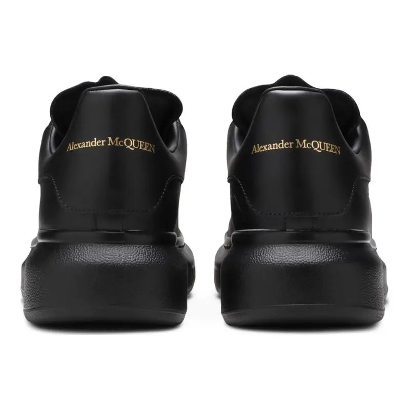 Alexander McQueen Schwarzer Leder Sneaker: Luxus, Komfort & Ikonischer Stil