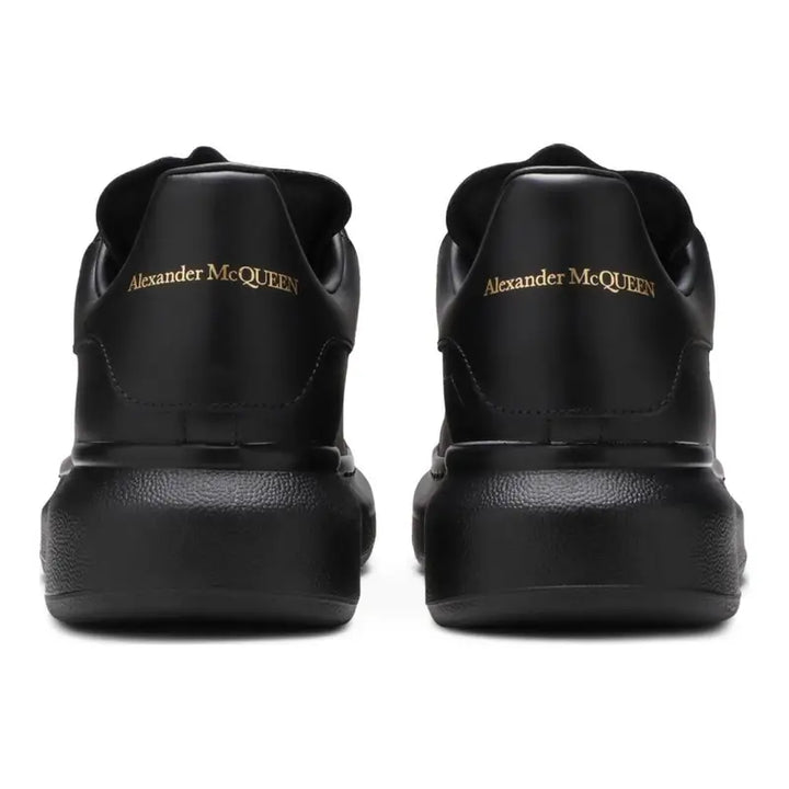 Alexander McQueen Schwarzer Leder Sneaker: Luxus, Komfort & Ikonischer Stil
