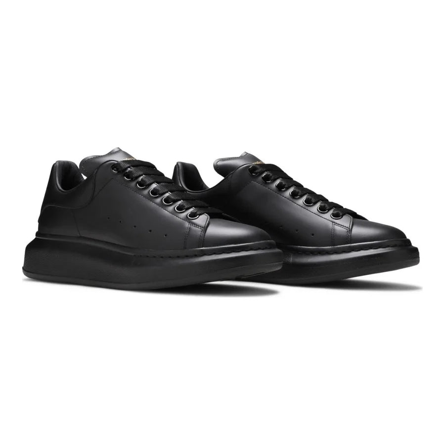 Alexander McQueen Schwarzer Leder Sneaker: Luxus, Komfort & Ikonischer Stil