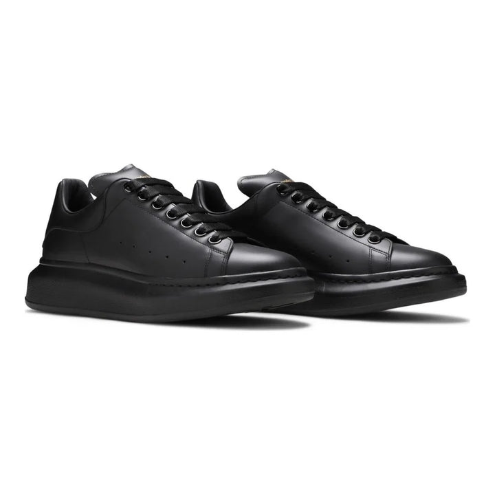 Alexander McQueen Schwarzer Leder Sneaker: Luxus, Komfort & Ikonischer Stil