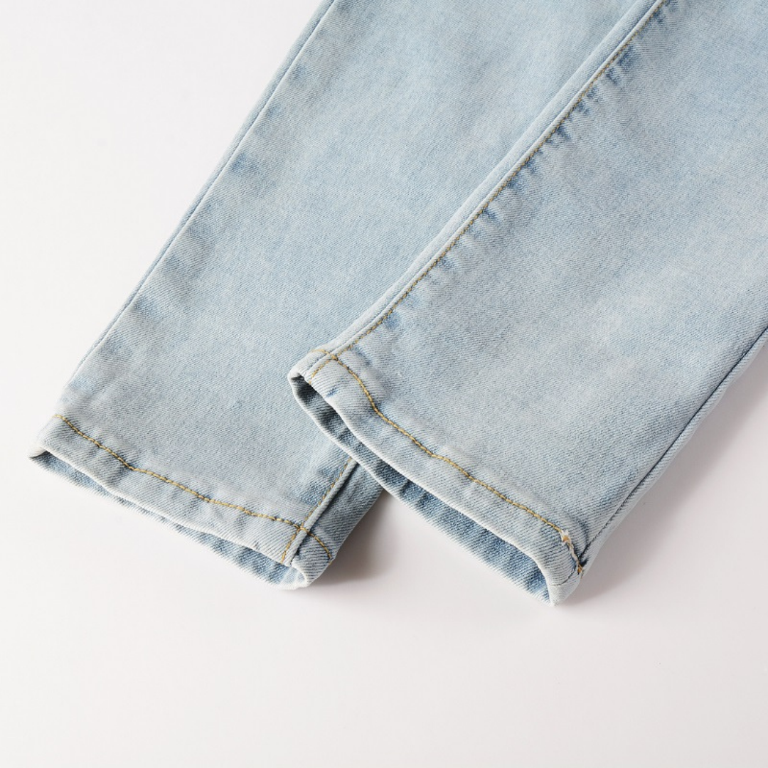 Amiri Schwarze Patch Blaue Designer Jeans für Herren – Slim Fit Stretch Denim