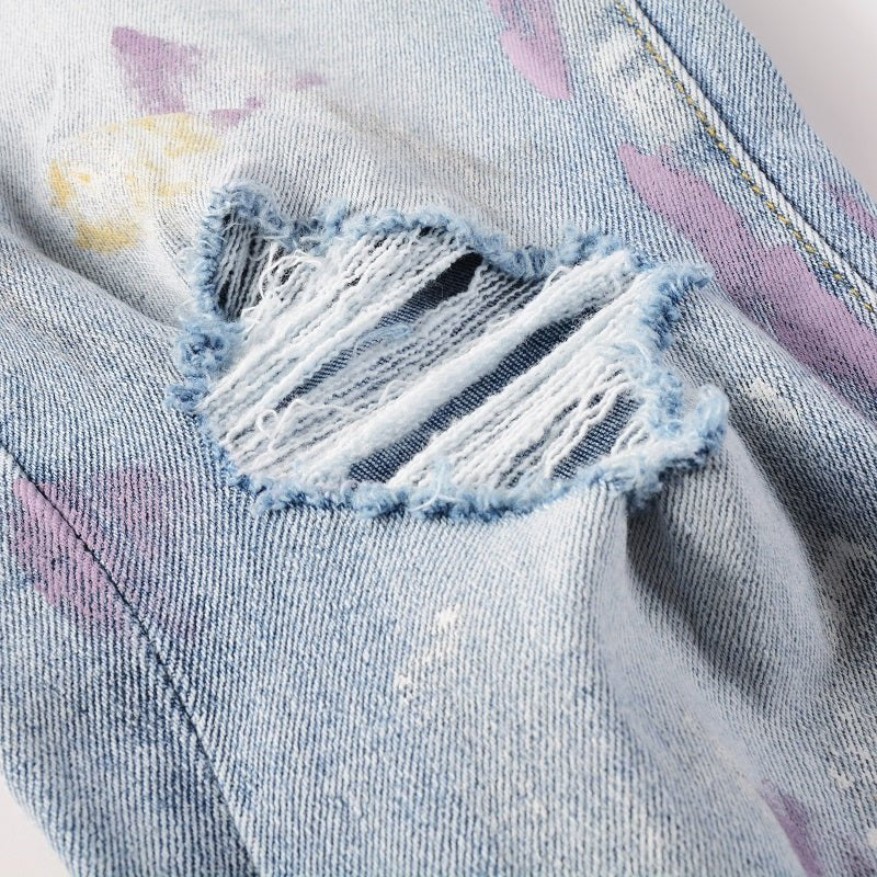 Amiri Herren Designer Jeans mit Farbspritzern – Stylische Blaue Denim Hose