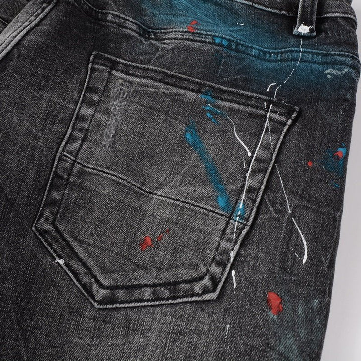 Amiri Sprühfarben Besprühte Schwarze Jeans Herren - Luxuriöse Designer Denim