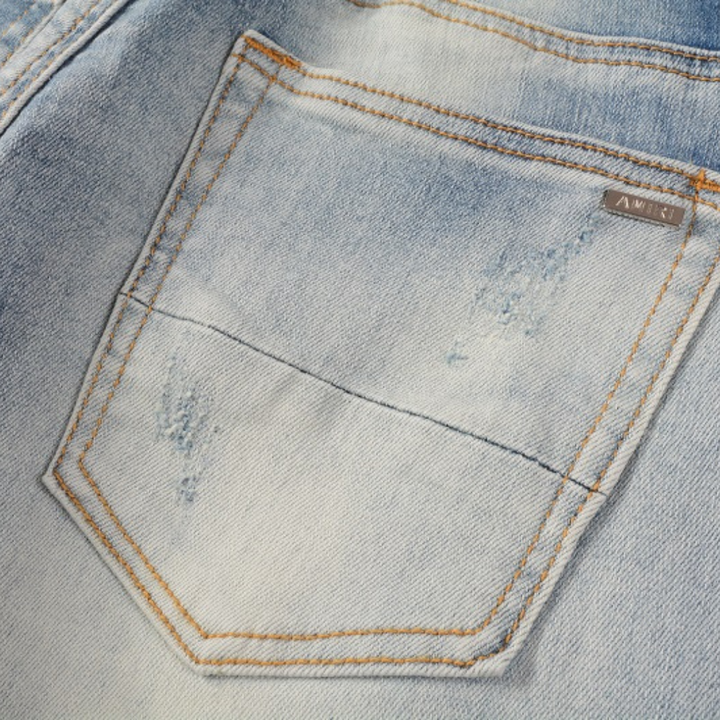 Amiri Blaue Distressed Designer Jeans für Herren – Stylisch, Hochwertig, Modern
