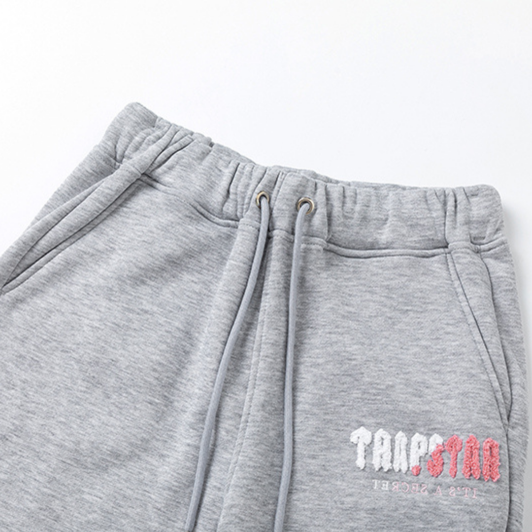Trapstar Decoded 2.0 Kapuzen-Trainingsanzug Grau-Pink: Stylisch, Bequem, Urban Streetwear
