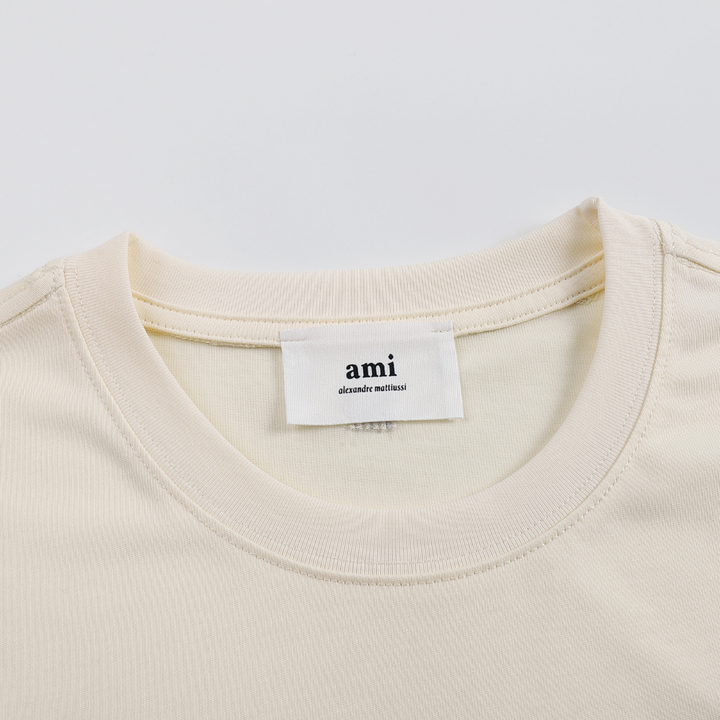 AMI Paris Baumwoll T-Shirt Herren: Stilvoll, Bequem, Herzlogo Design, Zeitlos Elegant