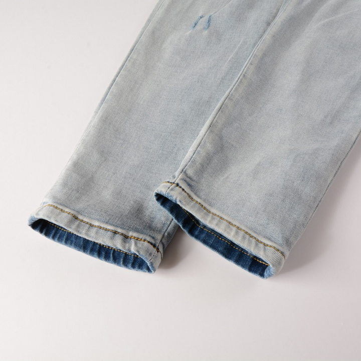Amiri Logo Distressed Jeans Herren – Stylische Ripped Denim mit Markenlogo