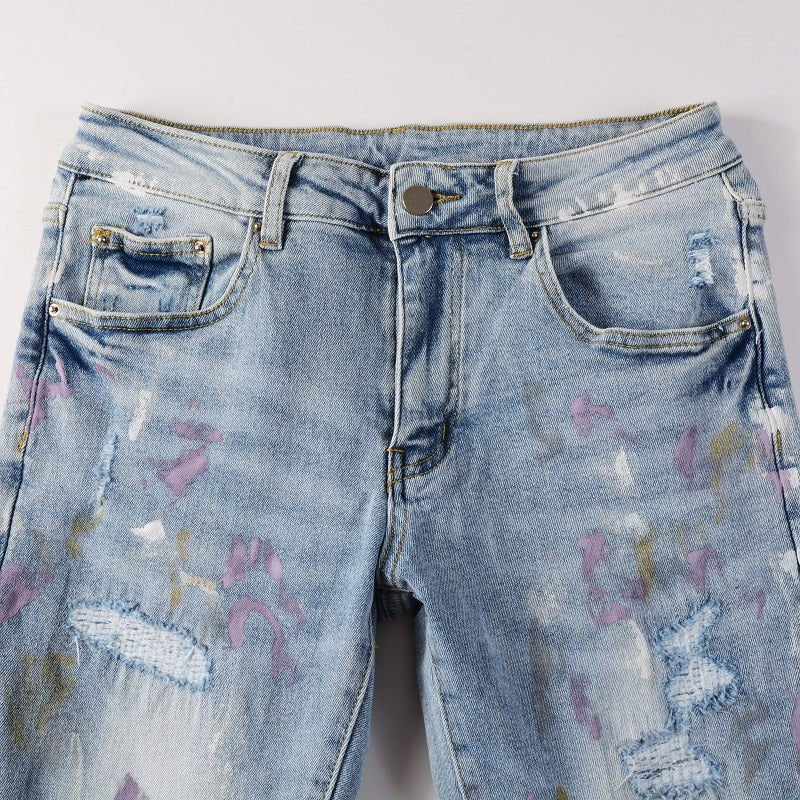 Amiri Herren Designer Jeans mit Farbspritzern – Stylische Blaue Denim Hose