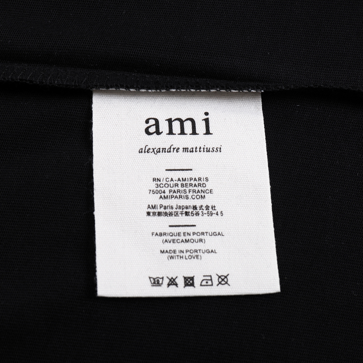 AMI Paris Unisex Herz-Logo T-Shirt: Premium Baumwolle für stilvollen Komfort