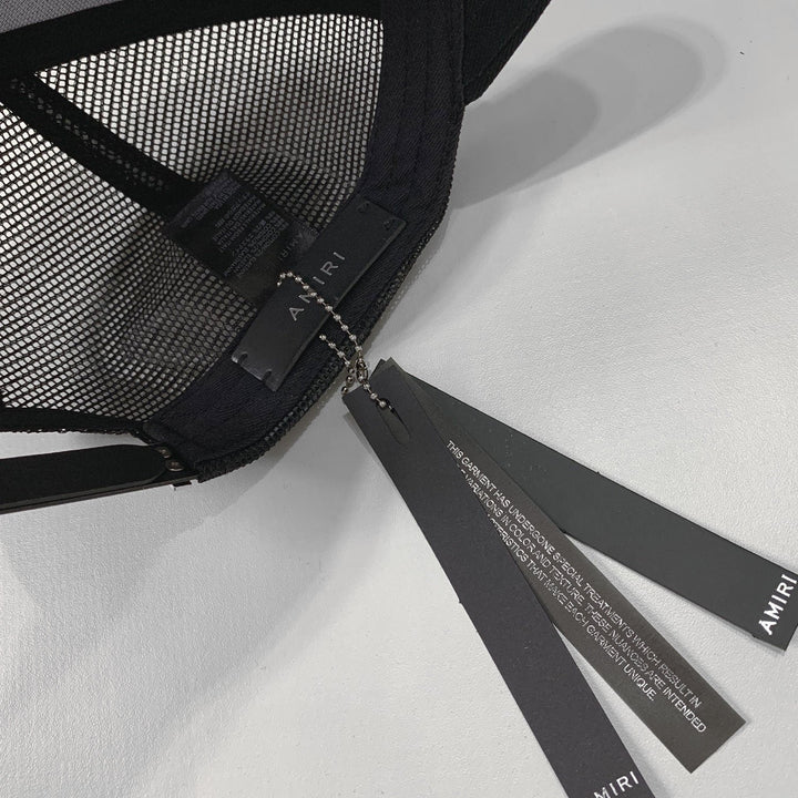 Exklusive Amiri Kappe Schwarz-Weiß – Luxuriöser Streetwear Designer Hut
