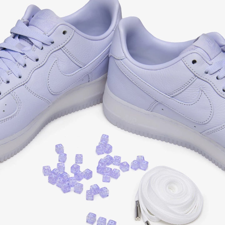 Nike Air Force 1 Low Drake NOCTA Violett Sneaker mit 'Love You Forever' Details
