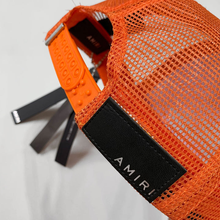 Luxuriöse Amiri Cap Orange-Schwarz mit Logo-Stickerei – Exklusives Streetwear Accessoire