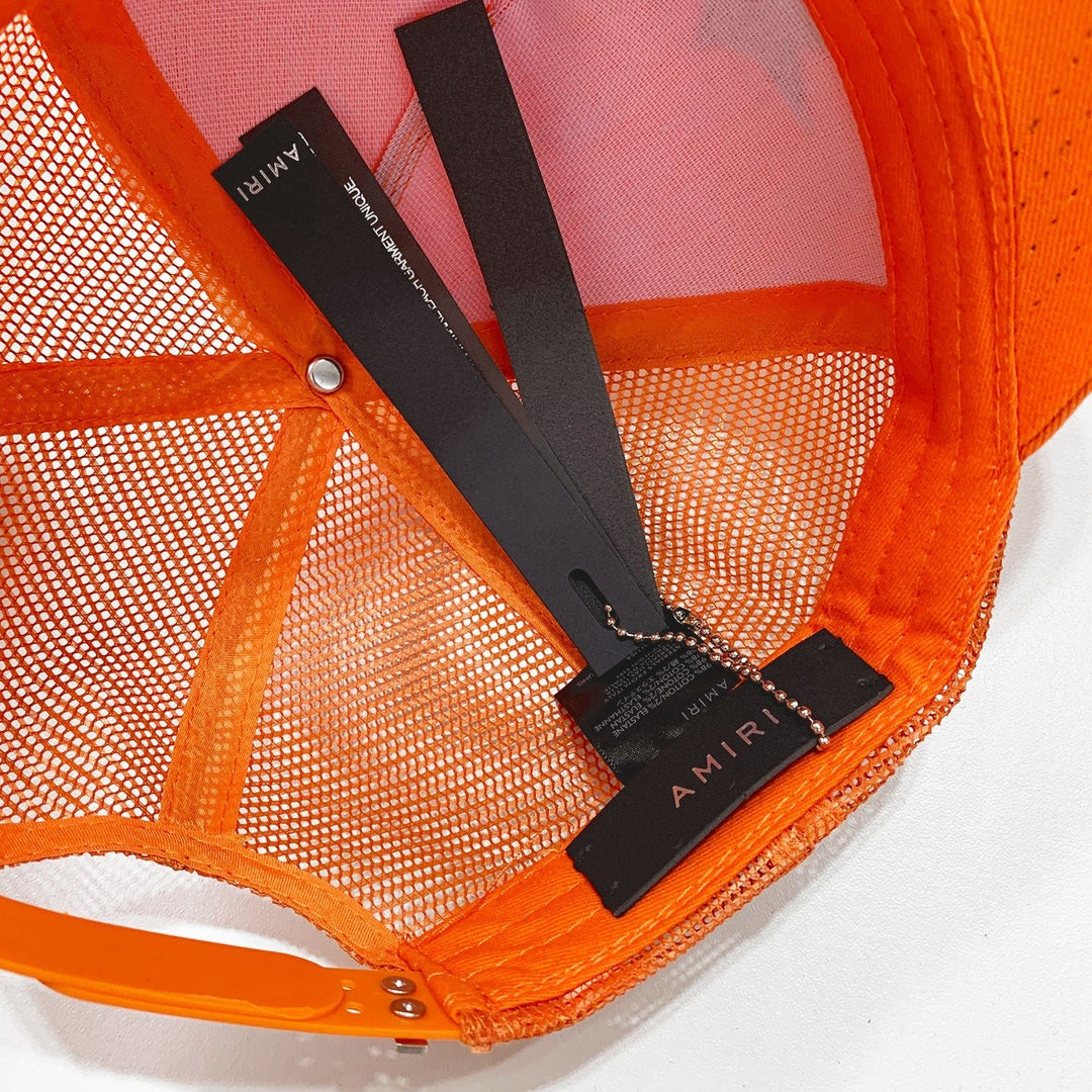 Luxuriöse Amiri Cap Orange-Schwarz mit Logo-Stickerei – Exklusives Streetwear Accessoire