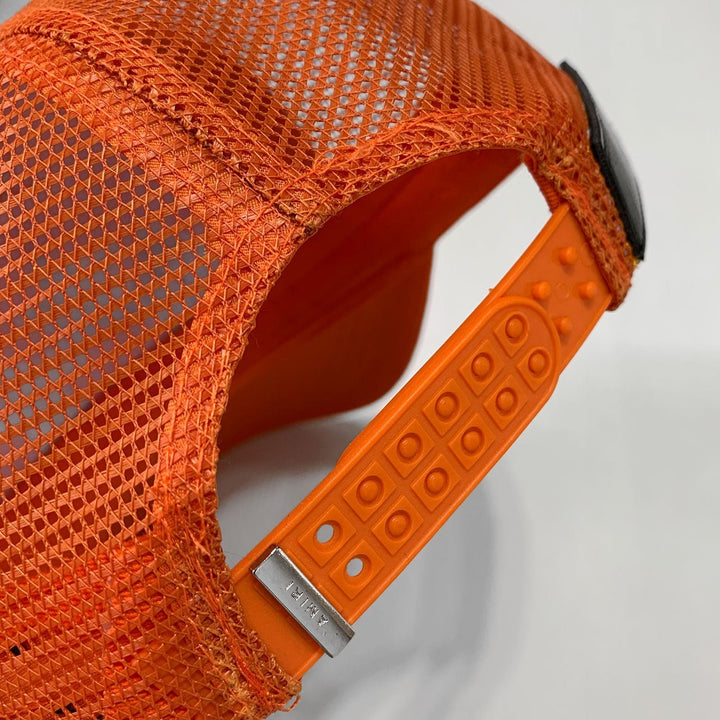 Luxuriöse Amiri Cap Orange-Schwarz mit Logo-Stickerei – Exklusives Streetwear Accessoire