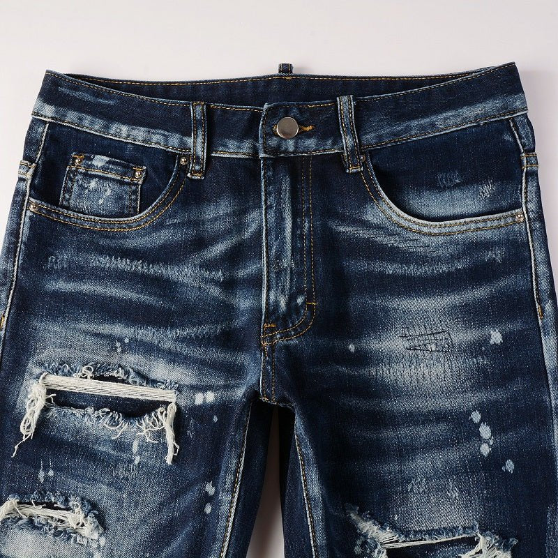 Amiri Paint Drip Blaue Herrenjeans – Luxuriöser Streetwear-Stil mit einzigartigem Design