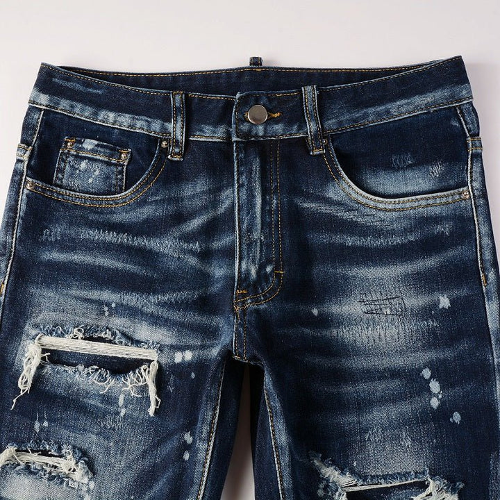 Amiri Paint Drip Blaue Herrenjeans – Luxuriöser Streetwear-Stil mit einzigartigem Design