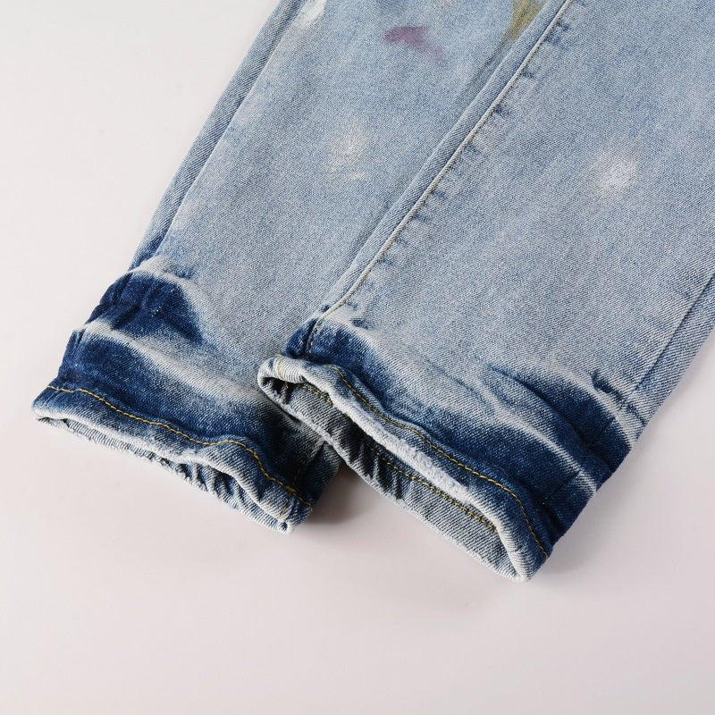 Amiri Herren Designer Jeans mit Farbspritzern – Stylische Blaue Denim Hose