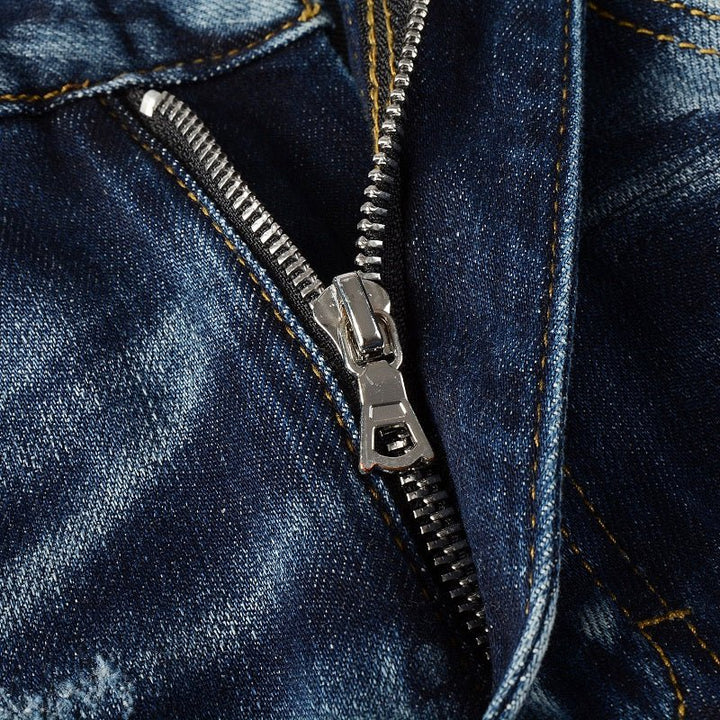 Amiri Paint Drip Blaue Herrenjeans – Luxuriöser Streetwear-Stil mit einzigartigem Design